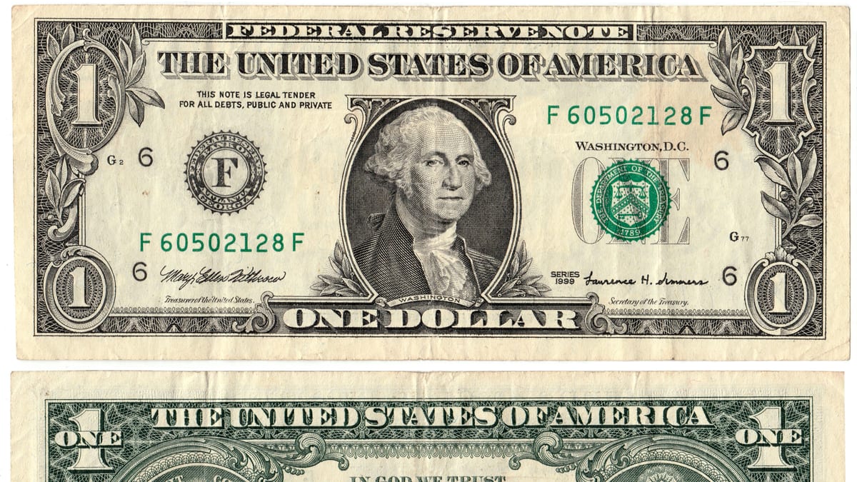 Billetes estadounidenses de un dólar vistos de ambos lados