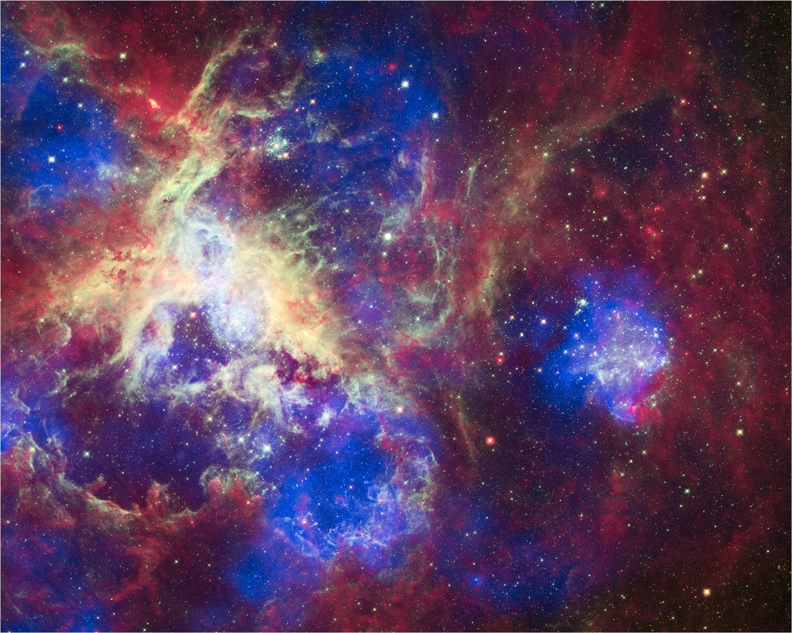 Nebulosa de la Tarántula observada por Webb. Foto de archivo de otra región de formación estelar de la Gran Nube de Magallanes.